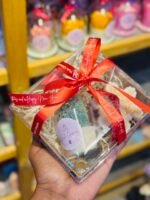 Christmas Tree Candle in shot glass with a snowflake candle in brown box