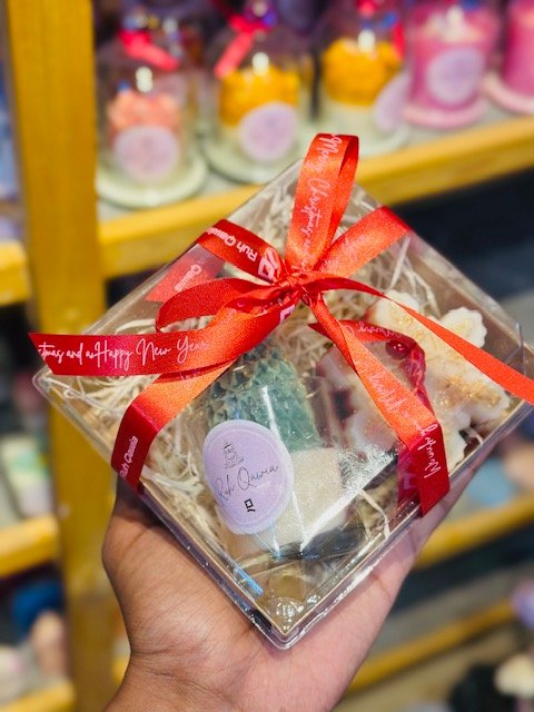 Christmas Tree Candle in shot glass with a snowflake candle in brown box